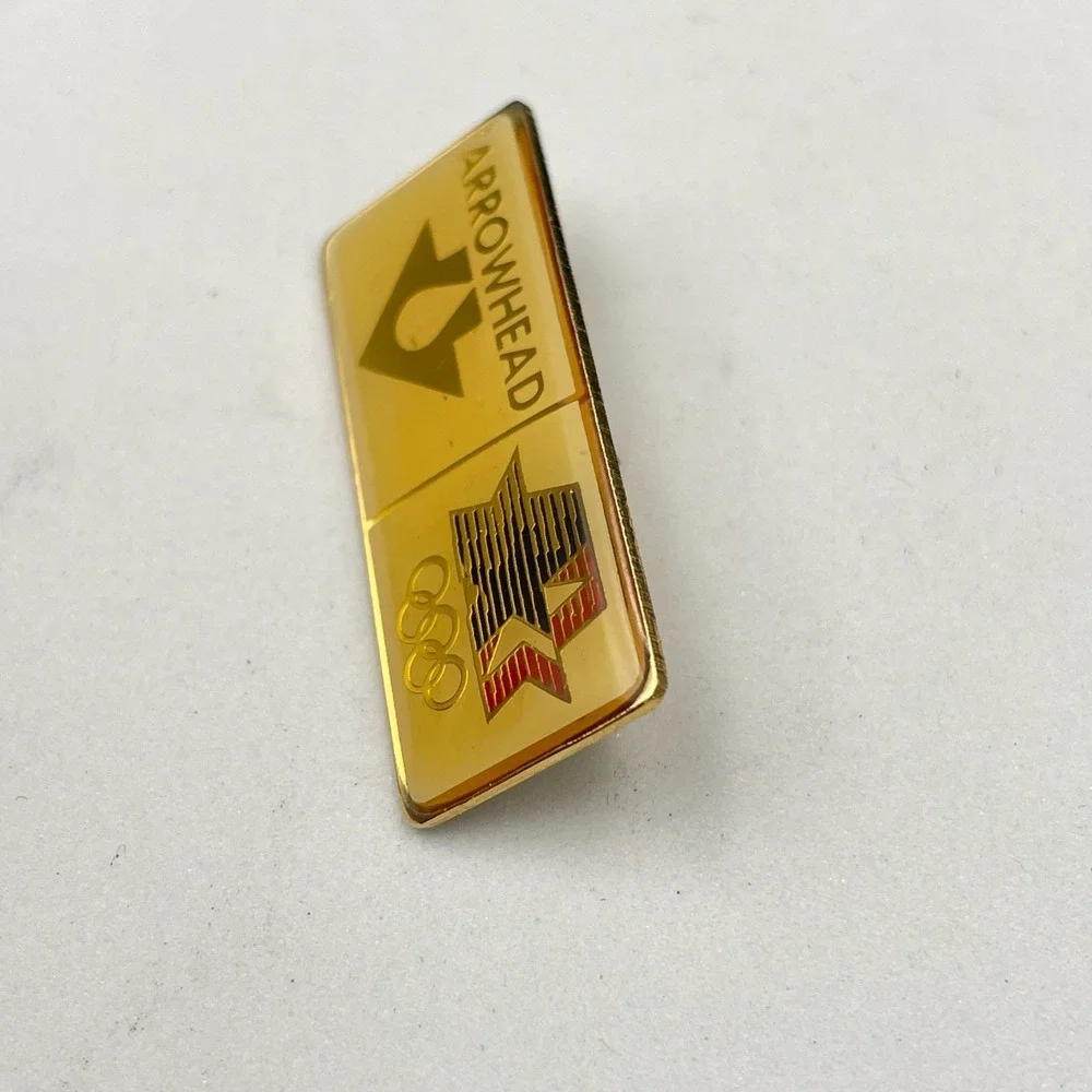 Vintage 1980 LAOLY Arco Olympics Classic Gold-Tone Arrowhead Water Lapel Pin 80s